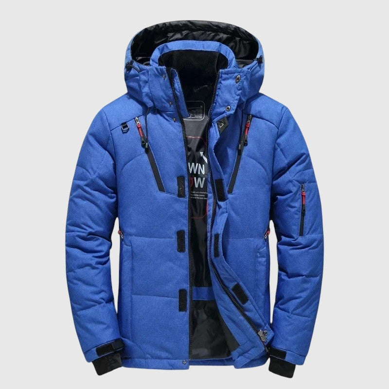 André – Hrejivé bundy s kapucňou a technickými detailmi